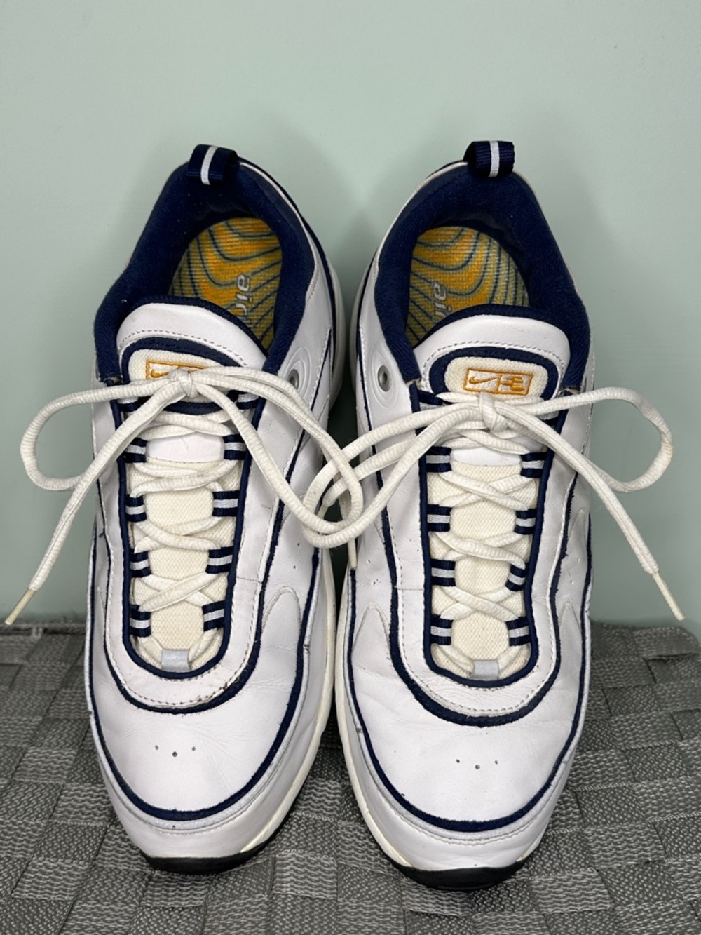 Nike White and Navy Low-Top Sneakers with Yellow Accents